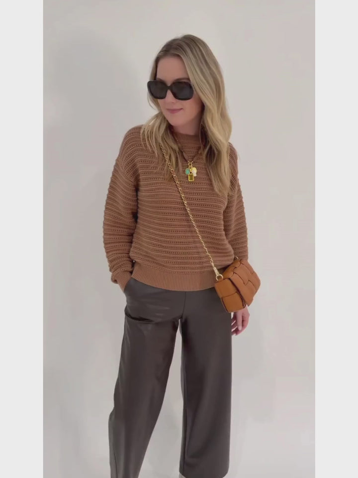 Varley Jarvis Relaxed Sweater in Golden Bronze paired with Max Mara Leisure Struzzo Vegan Leather Pants in Hazelnut, shown with BK Square Weave Leather Crossbody Bag in Camel and Lizzie Fortunato Marilla Necklace - all available at Barbara Katz
