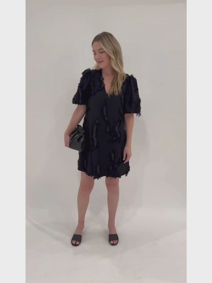 Stine Goya Black Puffy Sleeves Mini Dress with Mignonne Gavigan Christopher Gold Stud Earrings, and DeMellier Black Miami Clutch - all available at Barbara Katz