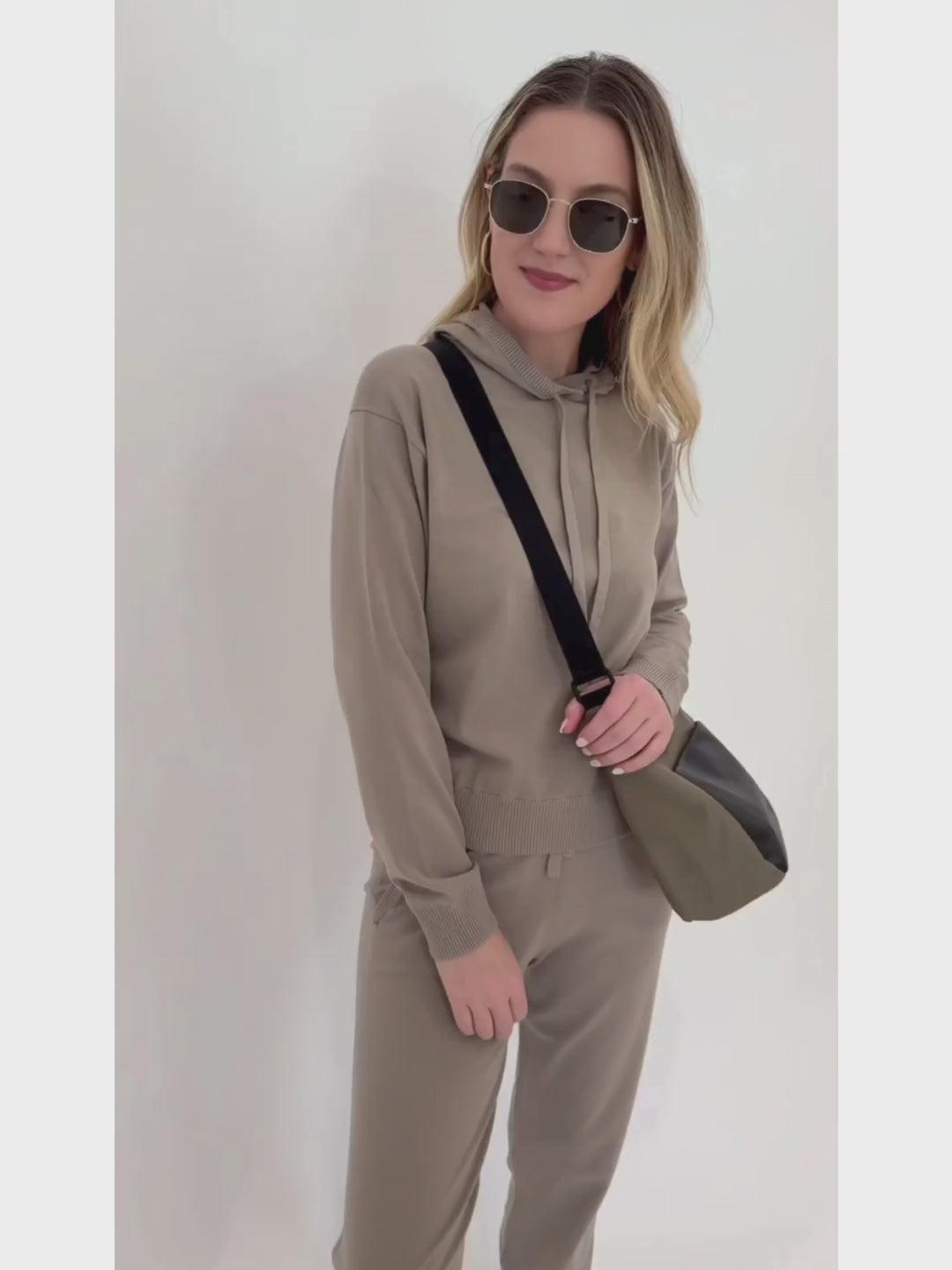 Max Mara Leisure Tesoro Sweatshirt in Turtledove paired with Pila Sweatpants and Daniella Lehavi Porto Small Crossbody Bag in Olive, Le Specs Neptune Sunglasses